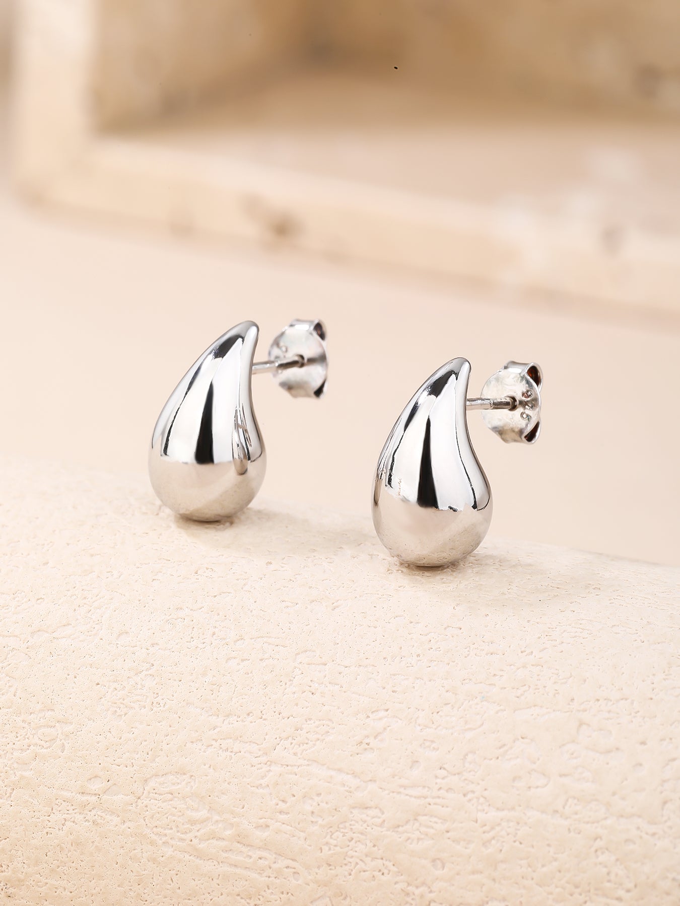 Teardrop Stud Earrings · Sterling Silver