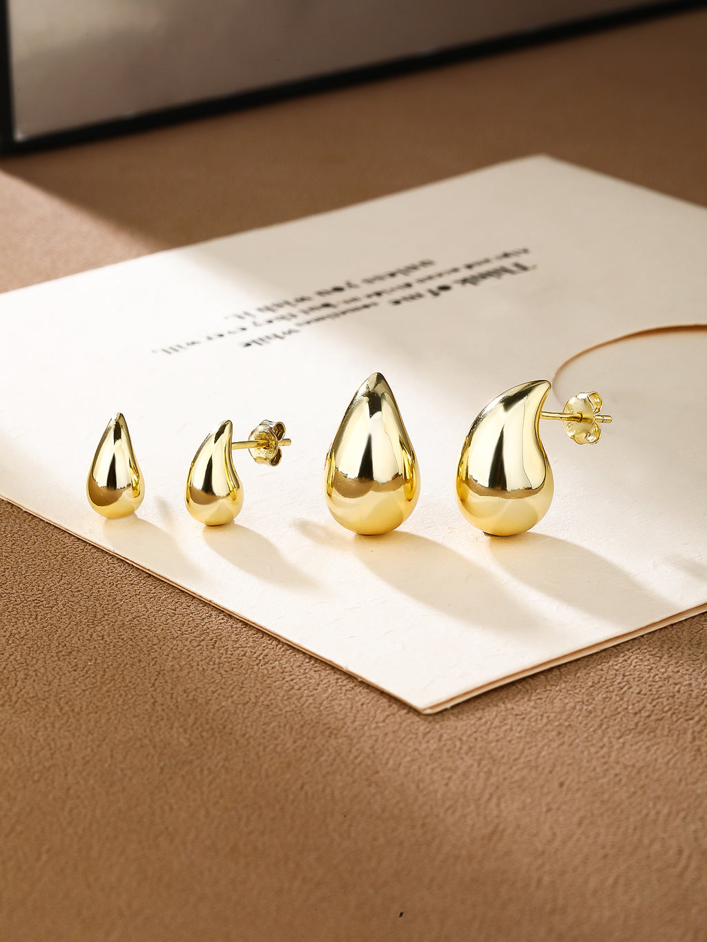 Teardrop Stud Earrings · Sterling Silver