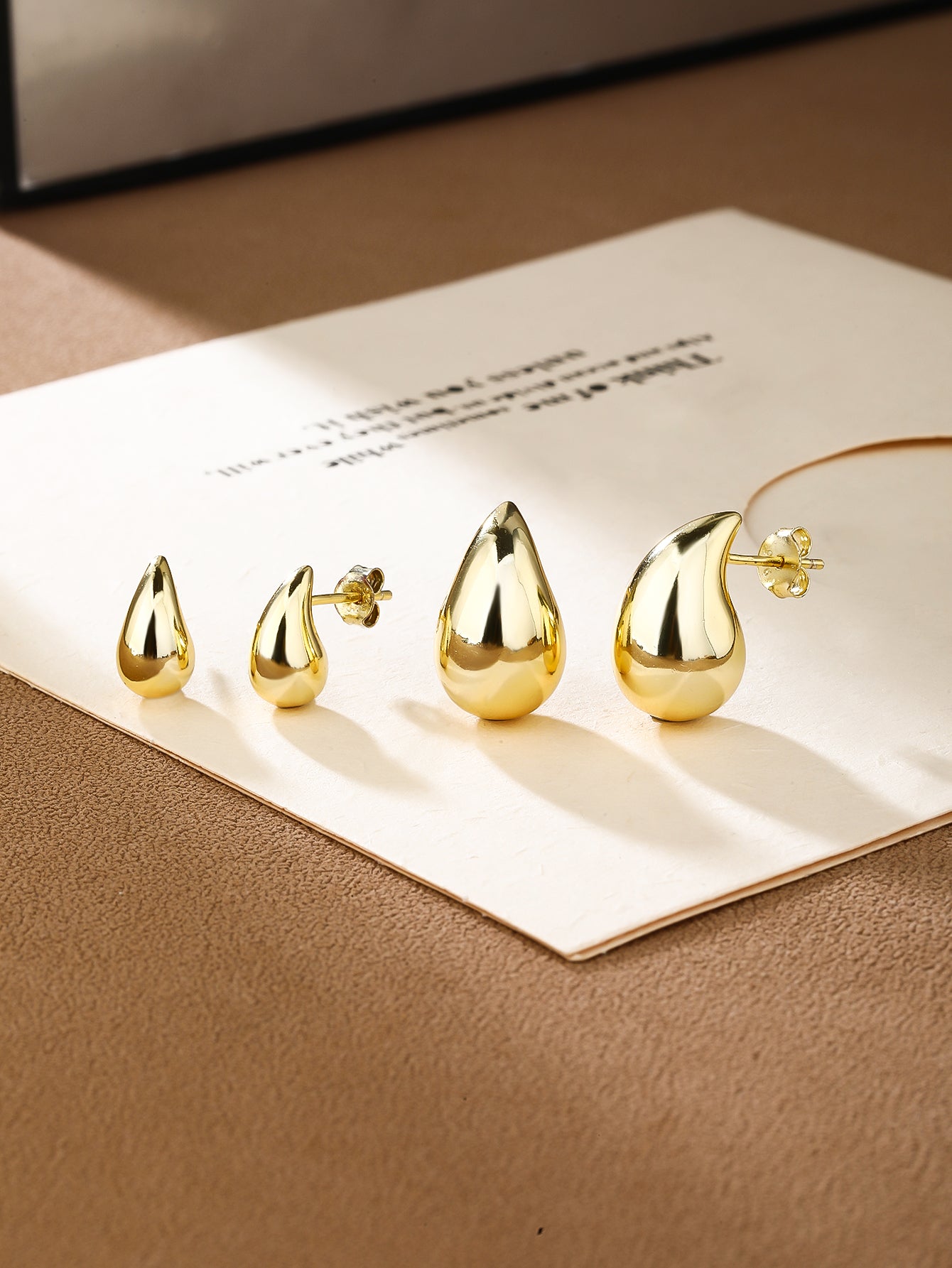 Teardrop Stud Earrings · Sterling Silver