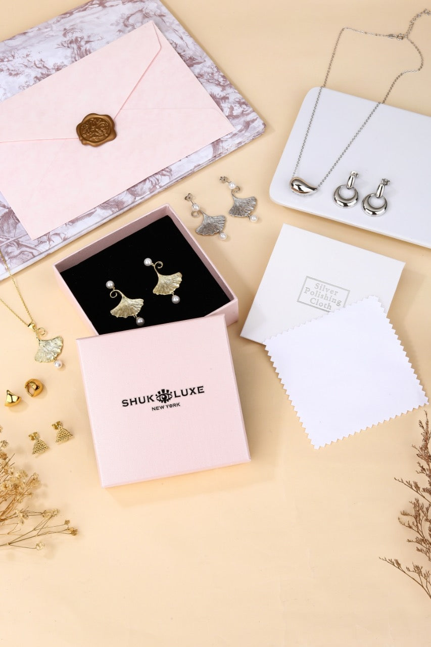 Teardrop Stud Earrings · Sterling Silver